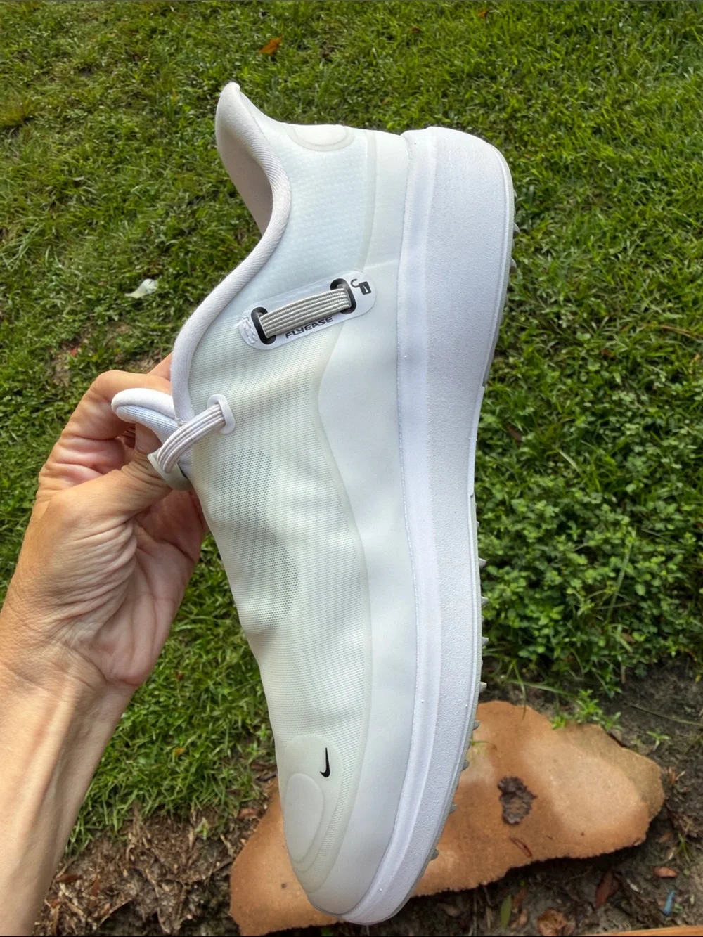 Nike Men’s White Slip-On Sneakers with Black Swoosh